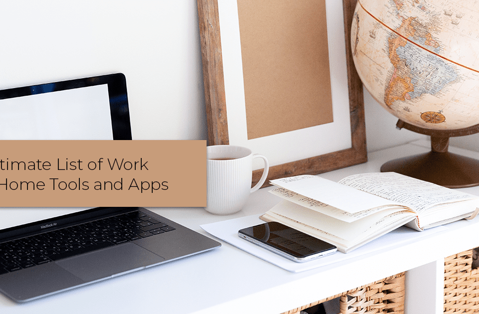 White desk with a laptop, globe, and a notebook on it detailing work from home tools to try.